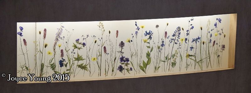 Pretty flowers pressed into acrylic (we think) that are part of the front desk at the Eielson Visitor Center.